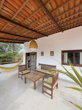 Casa da Palmeira - Com Varanda, Cozinha Completa,1 Quarto, Wifi e Ar Condicionado